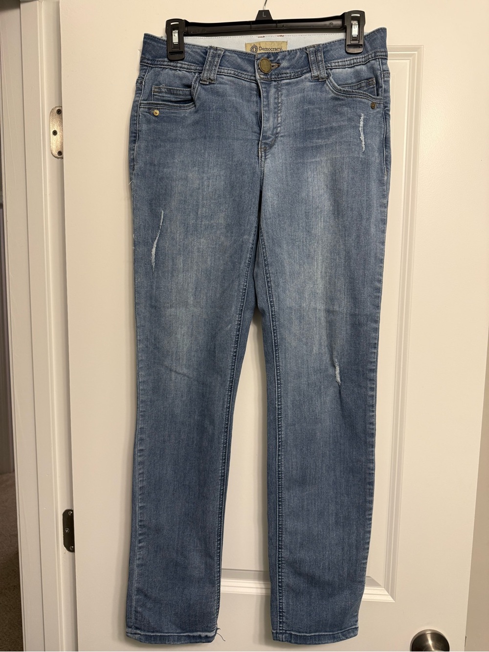 Light Blue Jeans With Small Rips